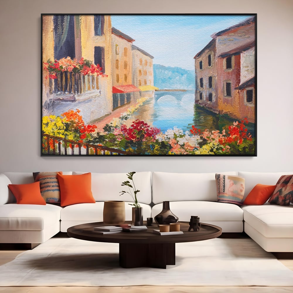 Tablou canvas cu pictura cu canal italian si flori, in rama de aluminiu negru, pe perete intr-un living